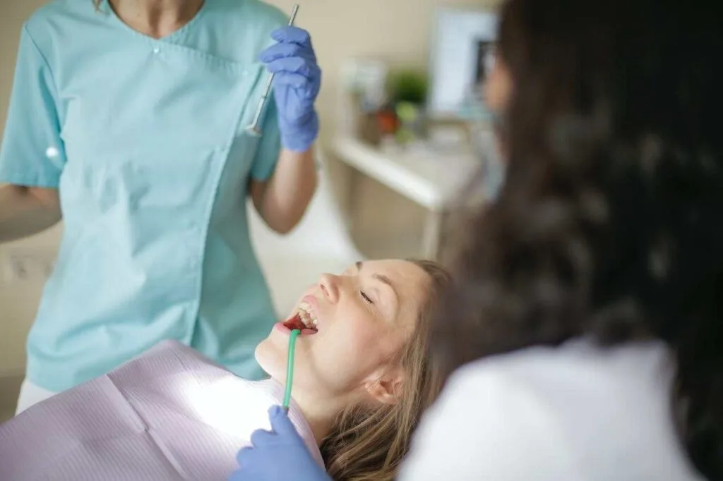 Dentist treating to Kill Tooth Pain 